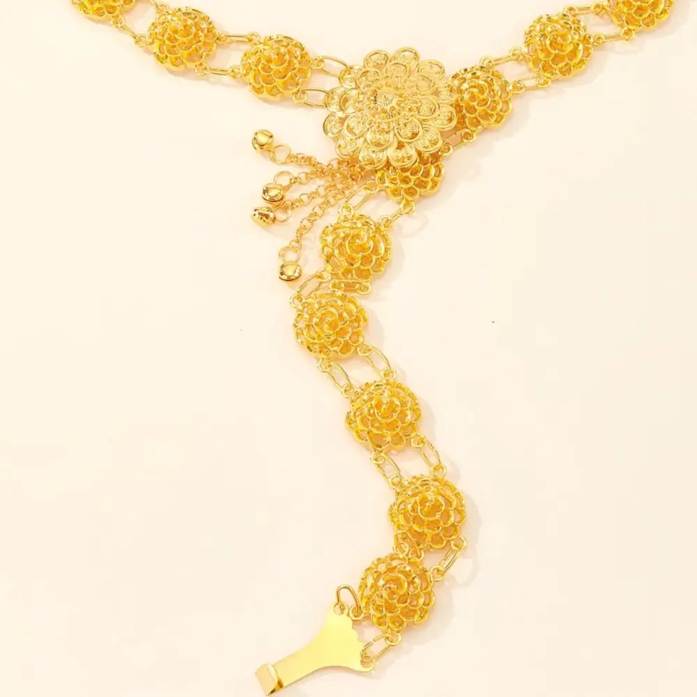 Gold-toned floral waist chain showcasing elegant floral design and refined craftsmanship