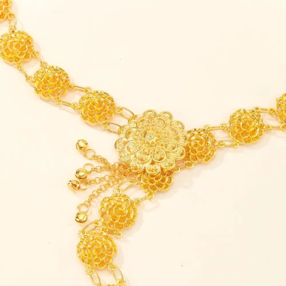 Ornate gold floral waist chain showcasing intricate craftsmanship and elegant design