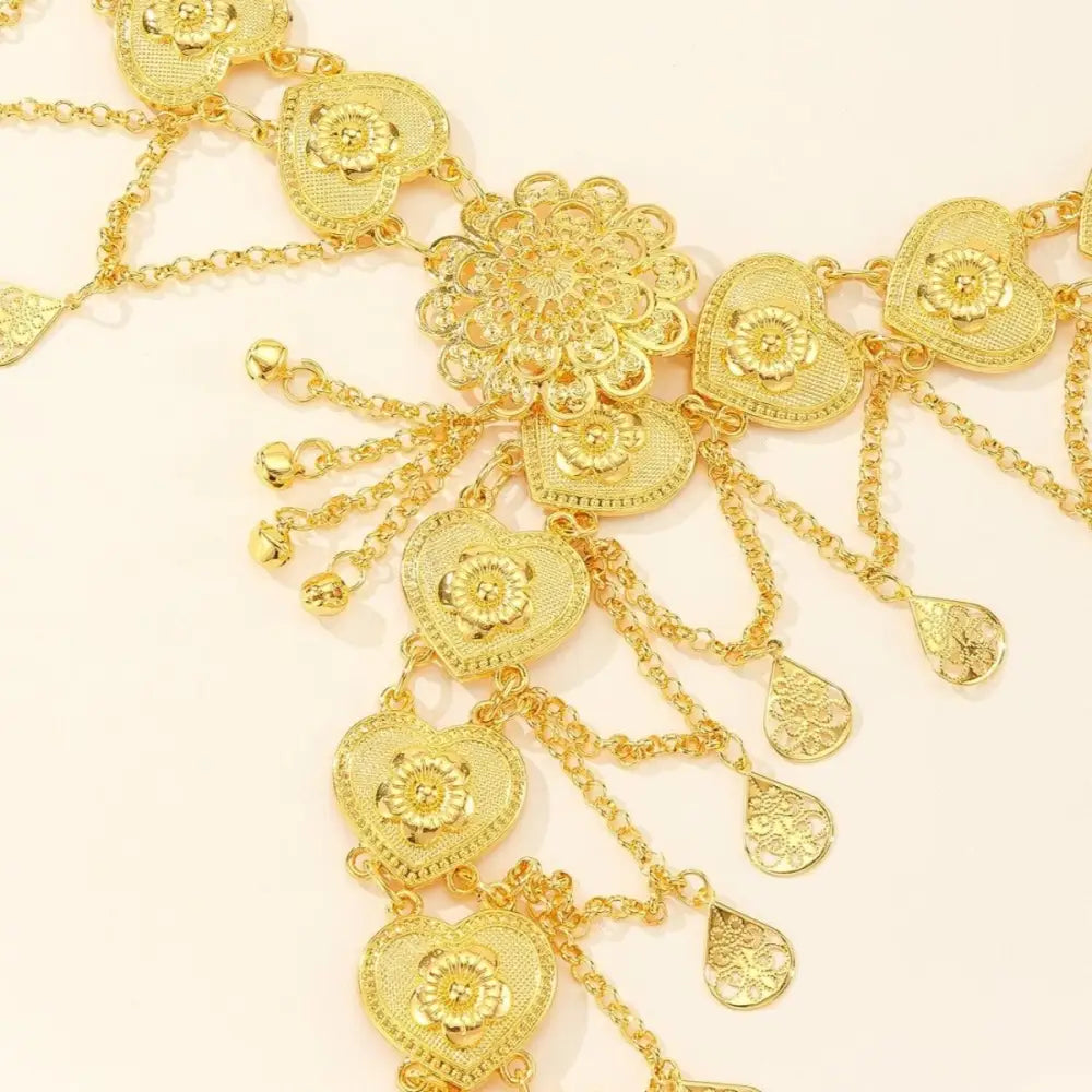 Gold-colored heart and flower-shaped jewelry with chain belts for elegant accessories