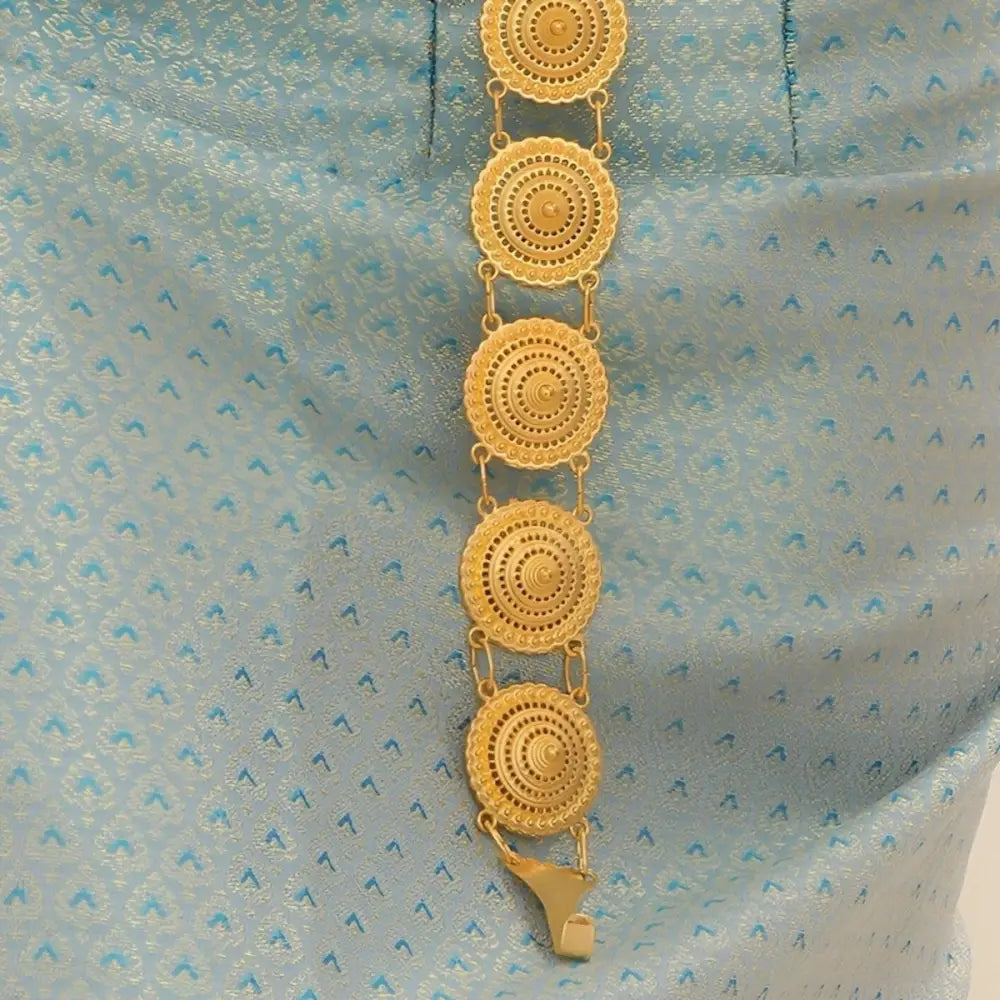 Gold circular link belt showcasing intricate Moroccan belt design with medallion details