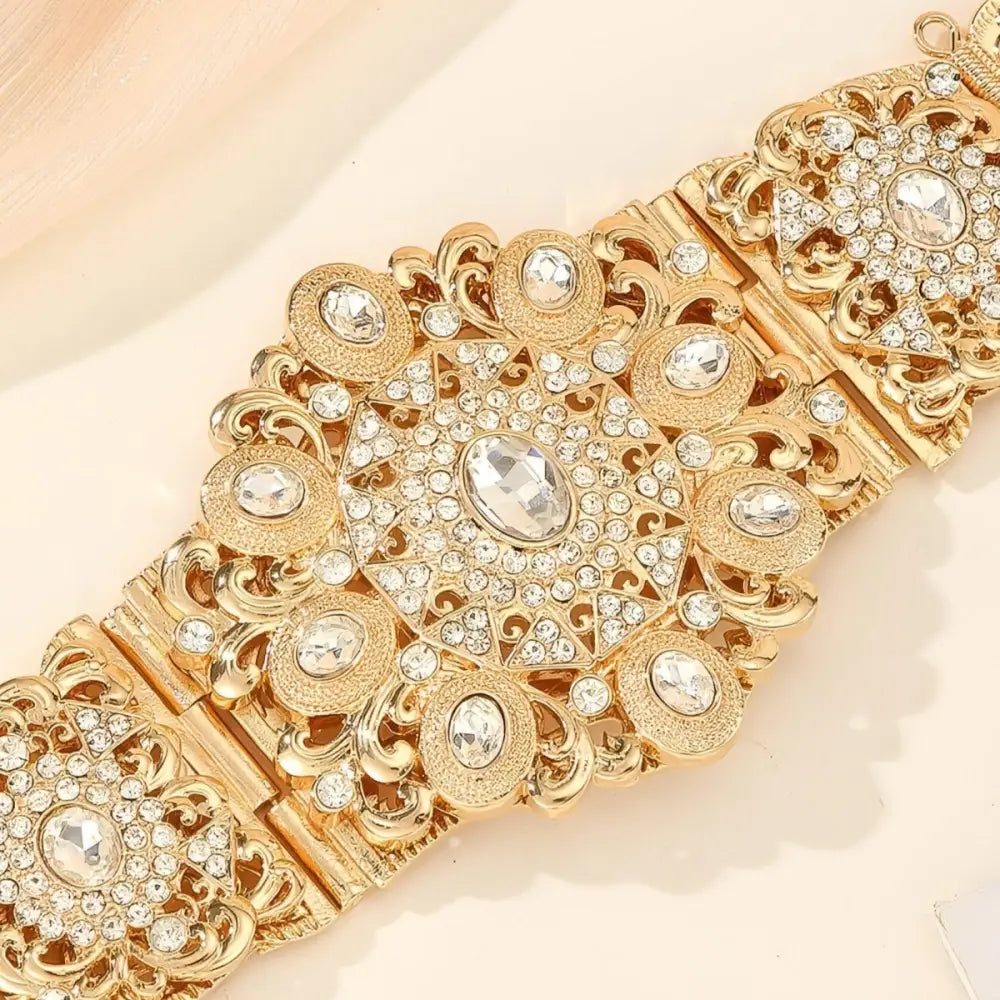 Ornate gold-tone Moroccan belt with jeweled and rhinestone embellishments for elegance