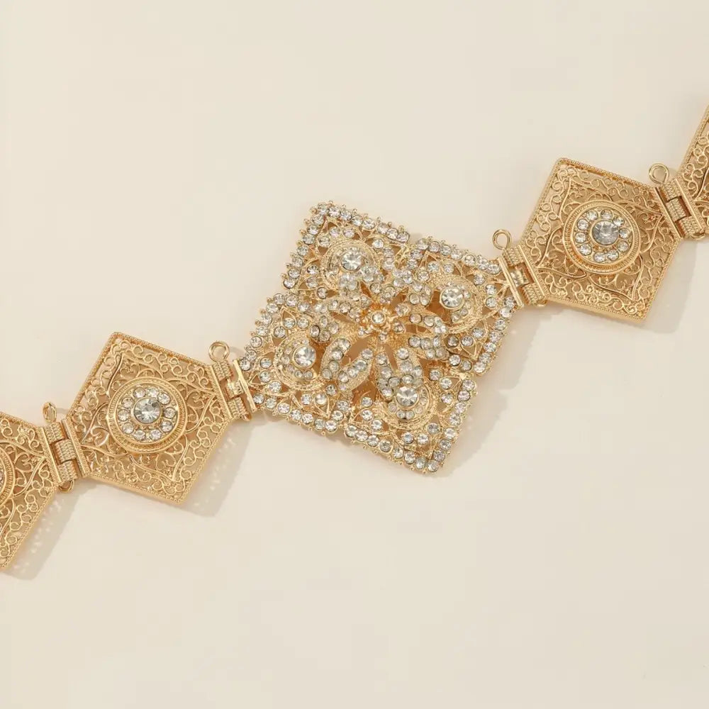 Gold-tone Moroccan belt with rhinestone embellishments for elegant accessory styling
