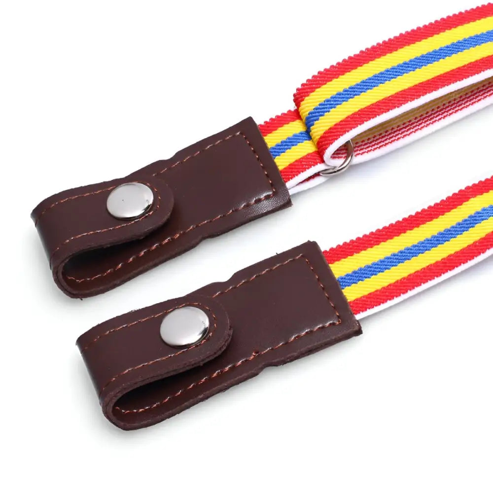 Striped suspenders with leather fasteners accenting Khaki Pants in the ensemble