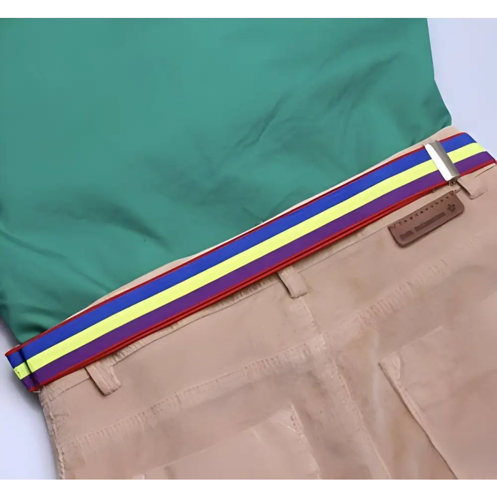 Tan pants with a colorful striped waistband paired with a green shirt ensemble
