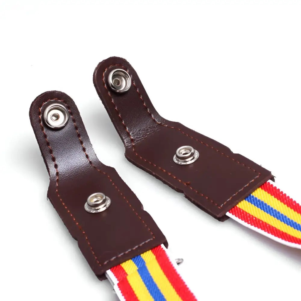 Brown leather suspender attachments featured in Khaki Pants with Striped Belt and Green Shirt Ensemble