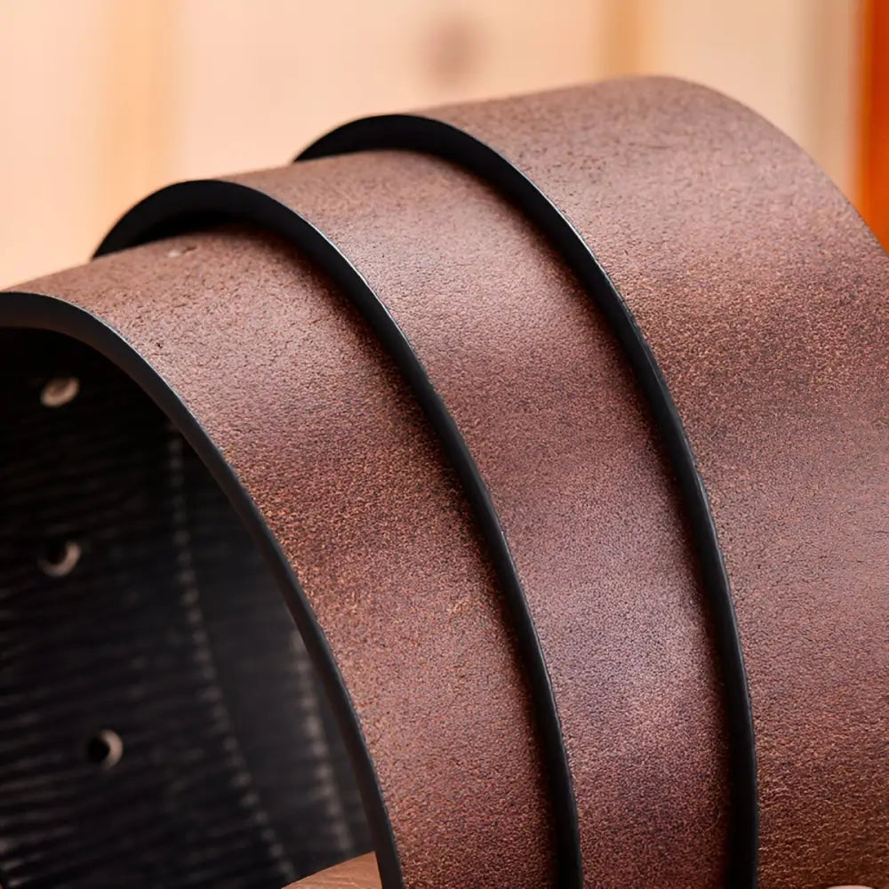 Brown leather belt layers with metal hardware from Leather Belts with Metal Hardware in Black and Brown Styles