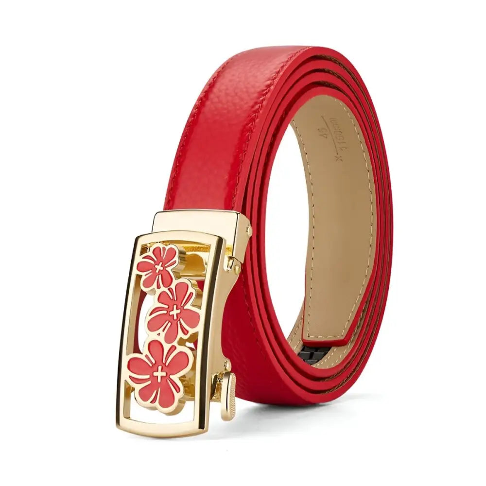 Red patent leather grained belt with unique floral buckle featuring three flowers