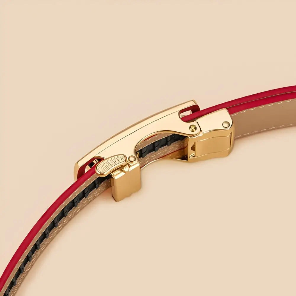 Red and tan grained leather belt with a unique floral buckle featuring three flowers