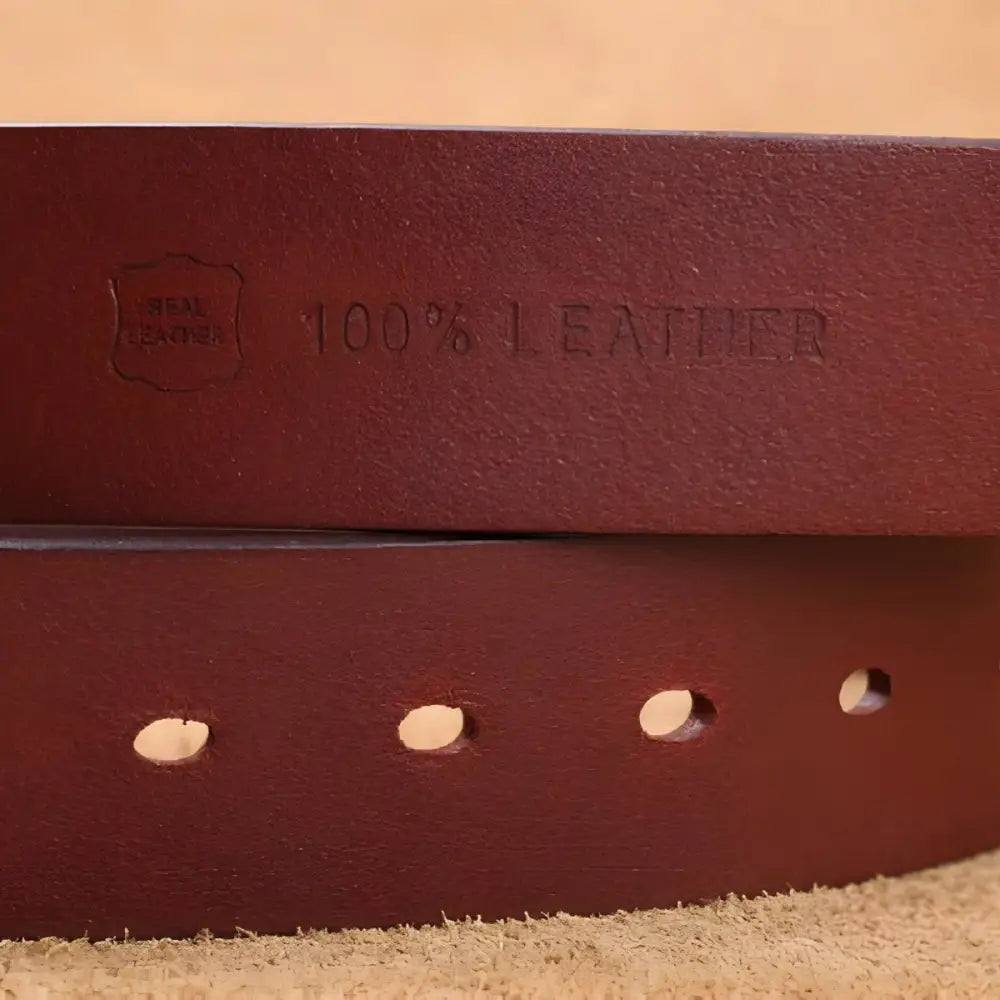 Maroon leather belt featuring a brass buckle, part of Leather Belts with Brass or Gold Buckles collection