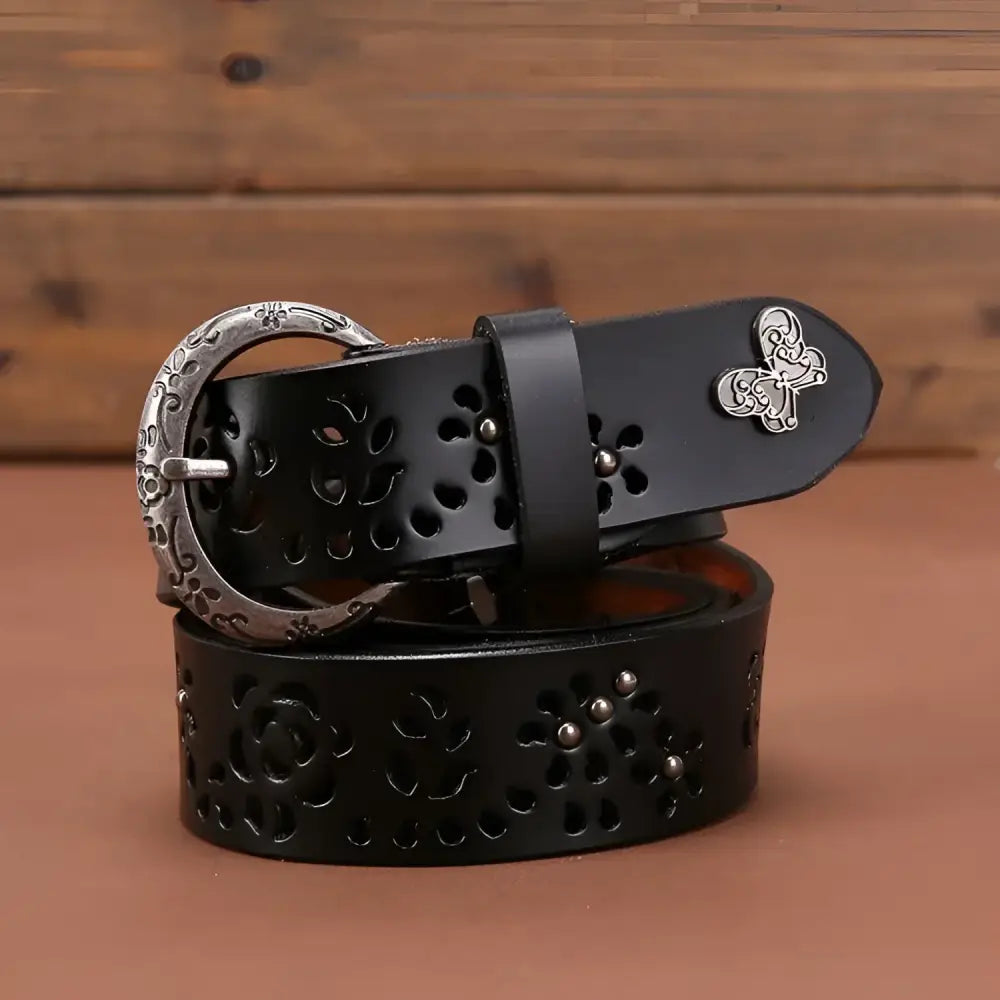 Black leather floral-cutout belt with decorative buckle from Leather Belts with Floral Cutouts