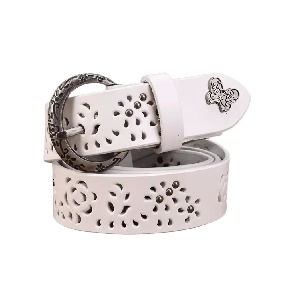 White leather belt with floral cutouts and decorative buckle for stylish accessory display