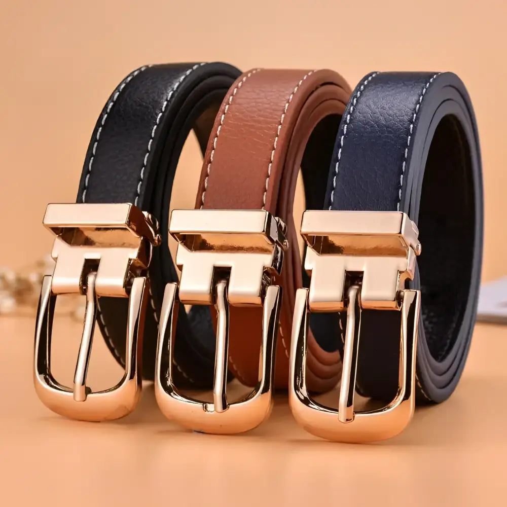 Three blue leather belts with gold buckles displayed in product named Leather Belts with Gold Buckles in Blue