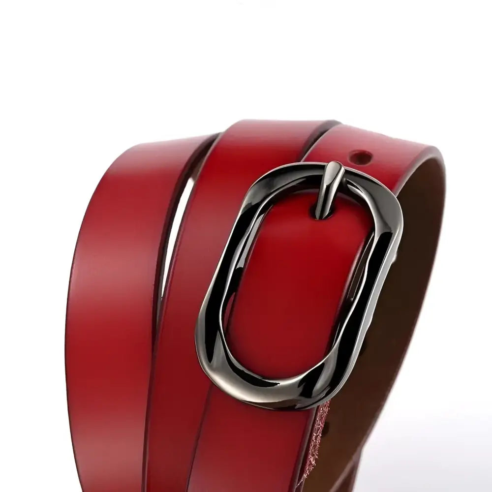 Red leather belt featuring a silver oval buckle from Leather Belts with Silver and Oval Buckles