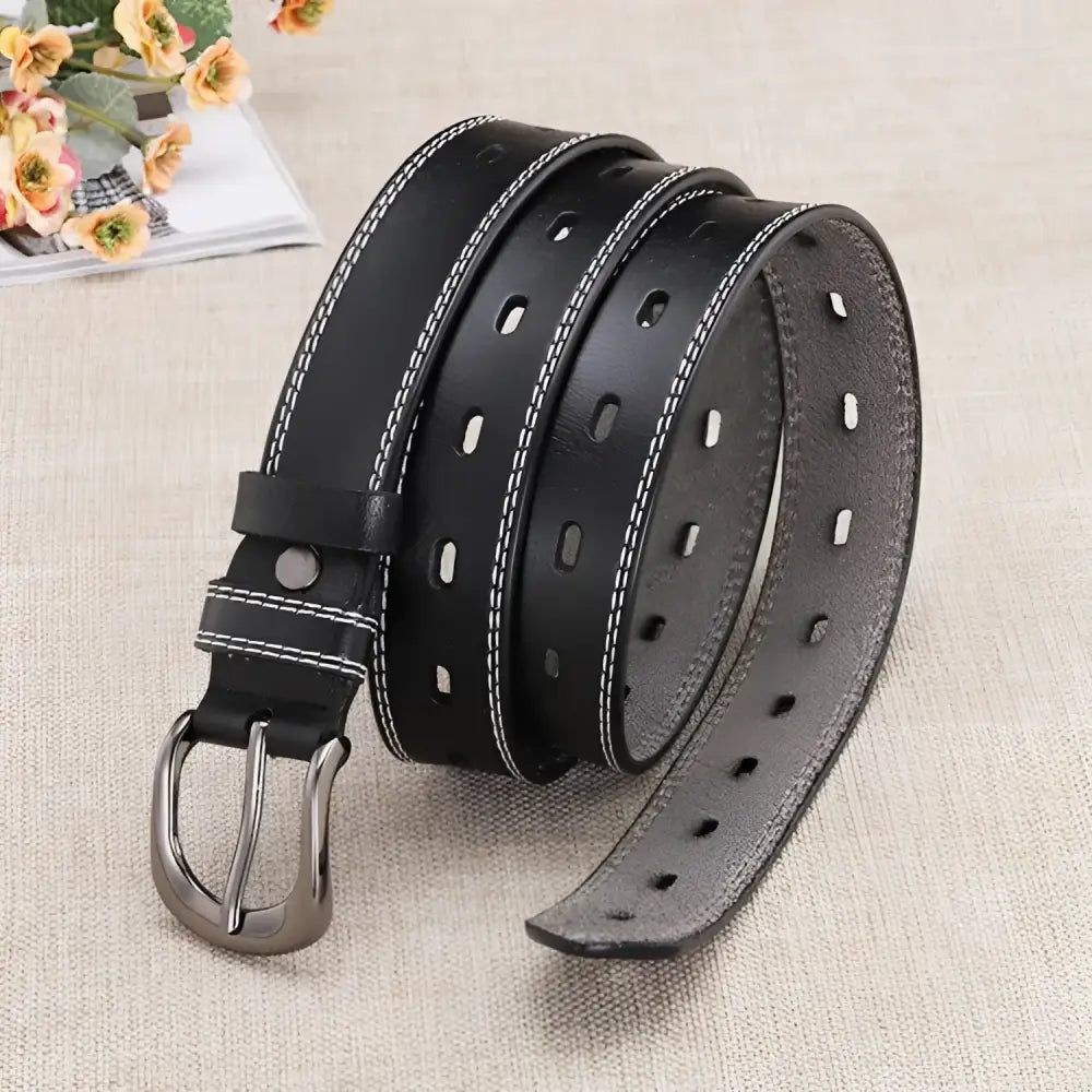 Black leather belt with double row of holes and silver buckle from Leather Belts with Silver Buckle and Multiple Hole Design
