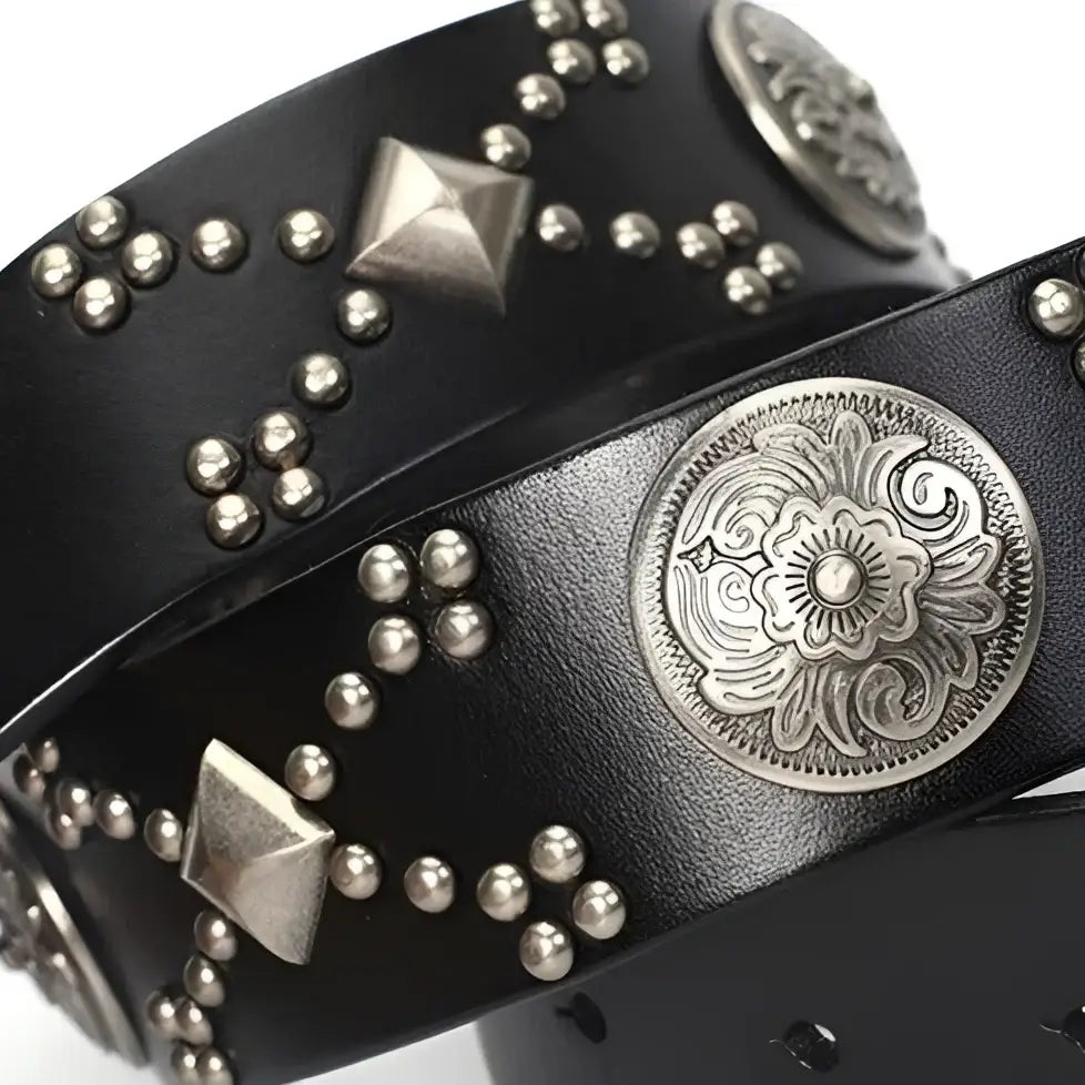Black leather studded belt featuring ornate silver buckle, Macawi Belt design