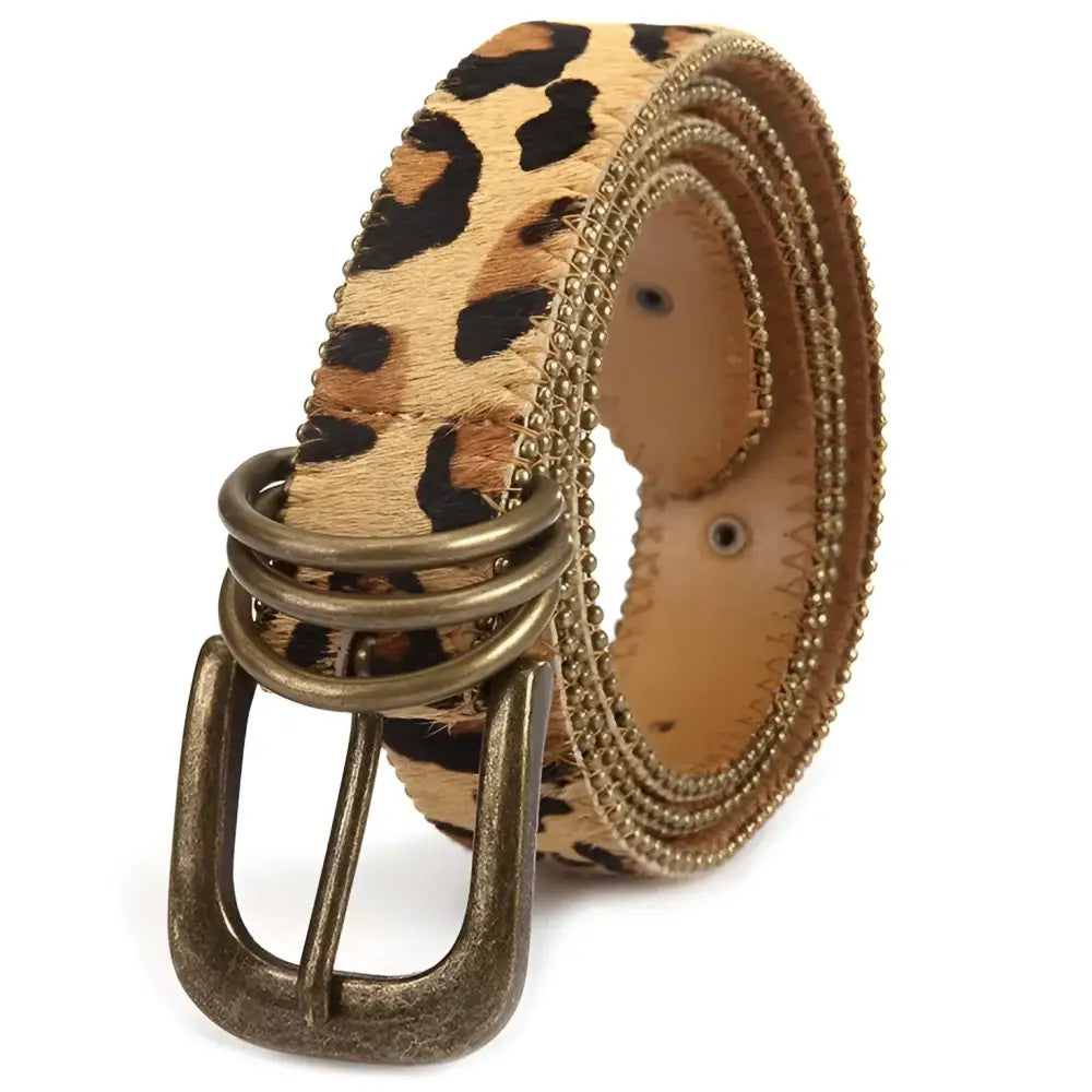 Nahuel belt featuring leopard print design with antique brass star accents