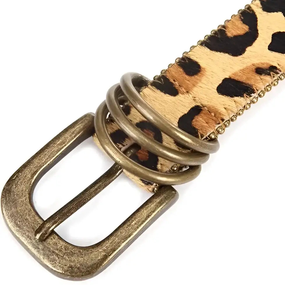 Nahuel belt featuring leopard print design and antique brass star buckle for stylish accents