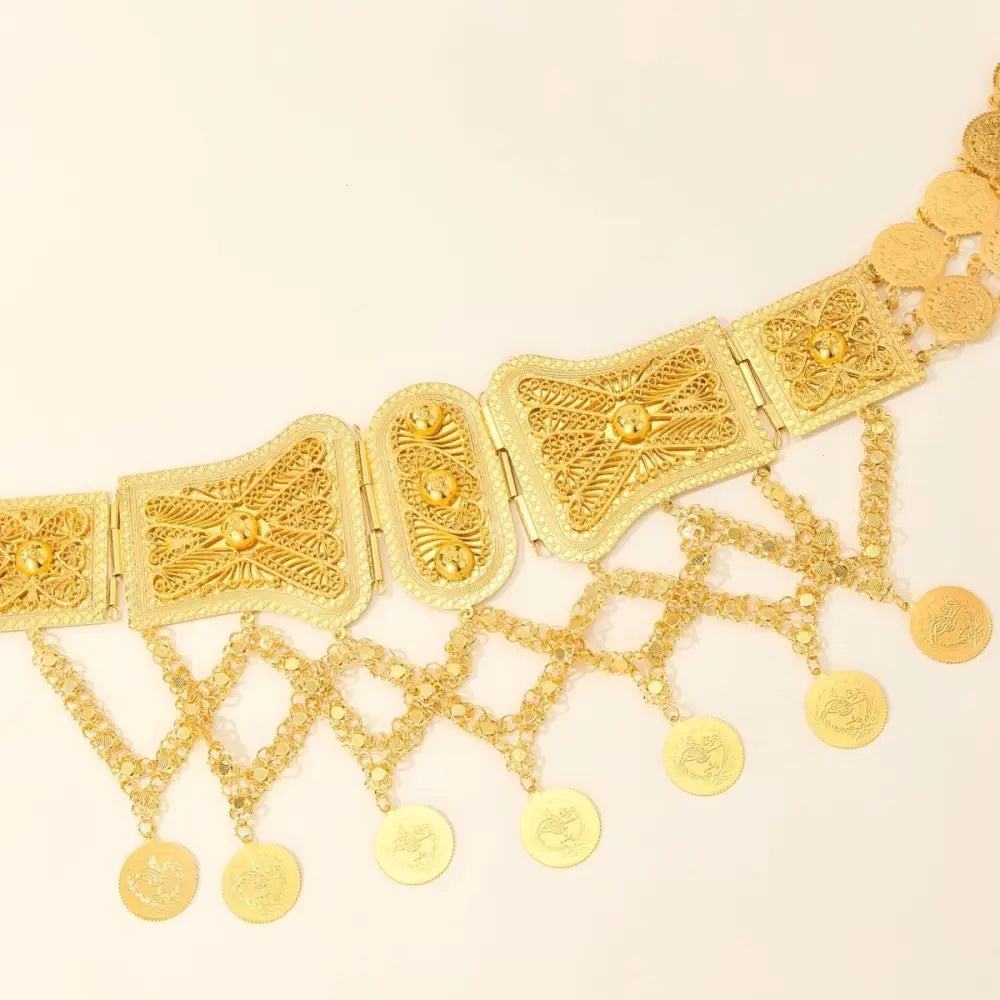Ornate gold coin belt with dangling coins showcasing intricate craftsmanship