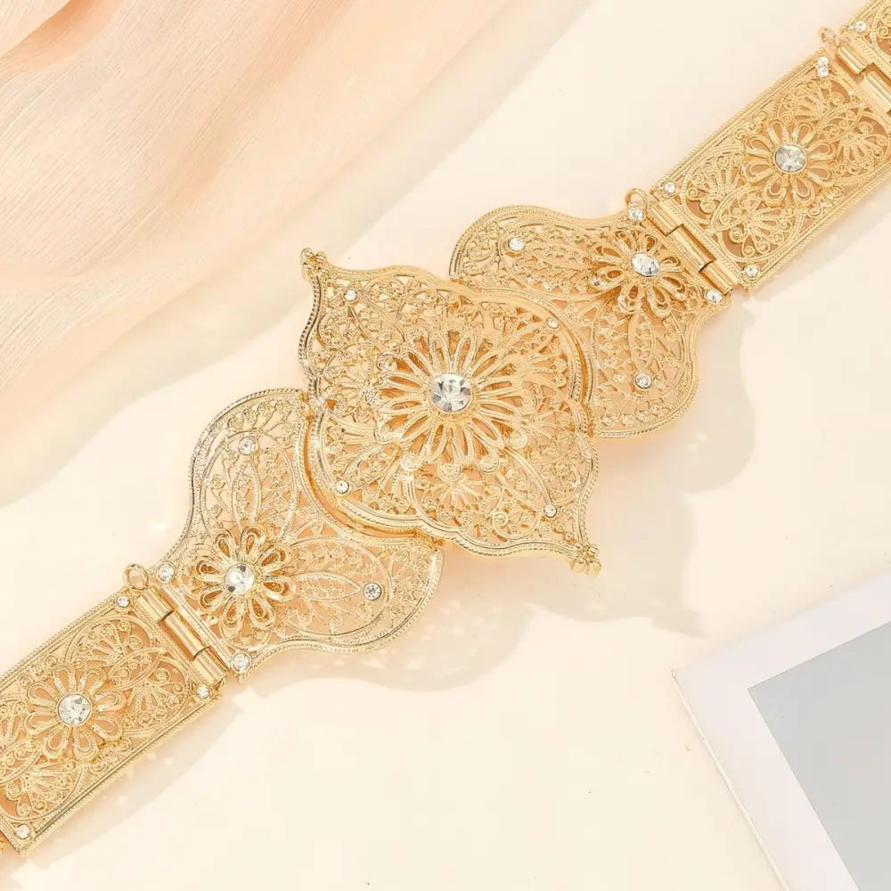 Elegant ornate gold metal belt displayed in the Ornate Gold Metal Belt product image