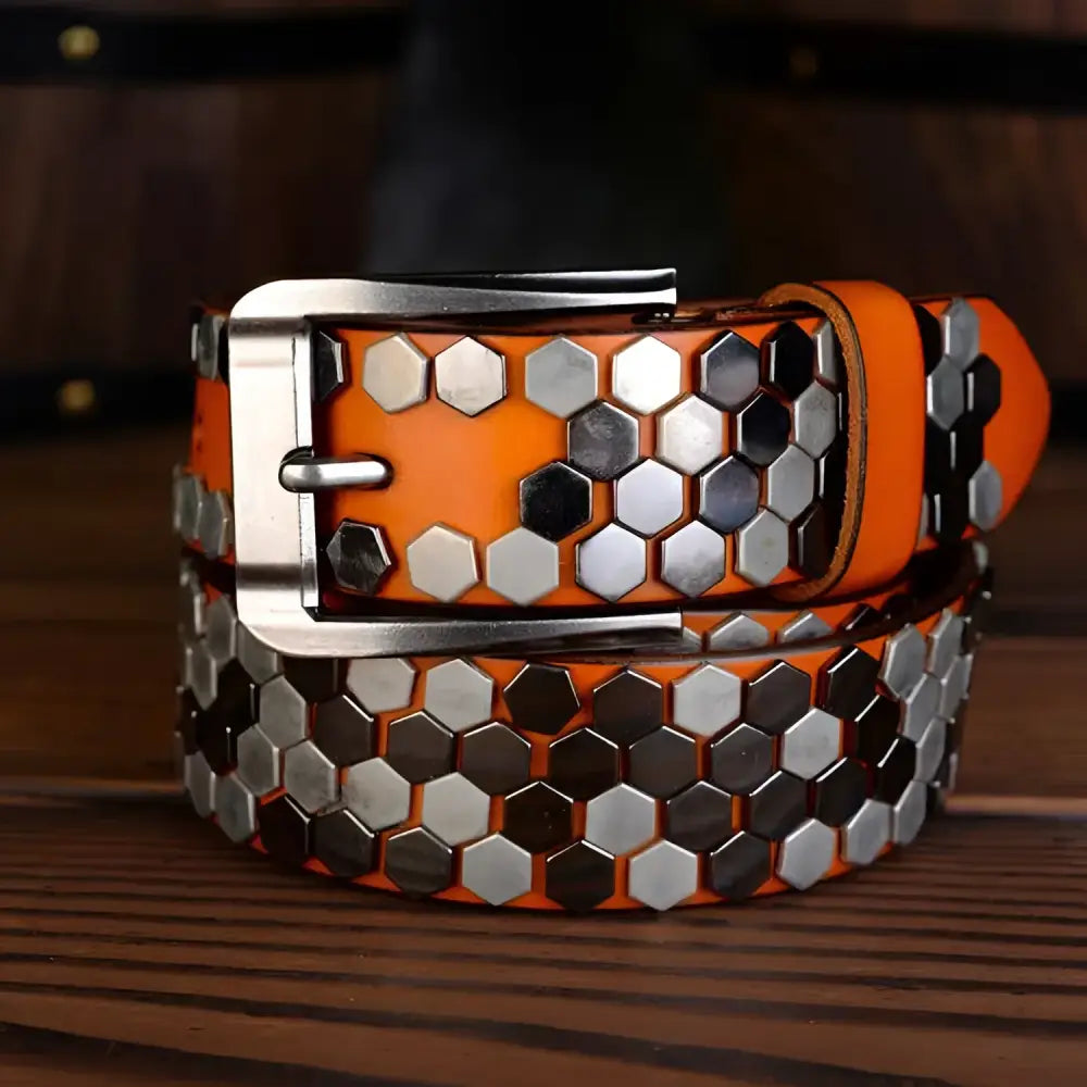 Orange leather studded belt with silver hexagon studs from the Osonia Studded Belt collection