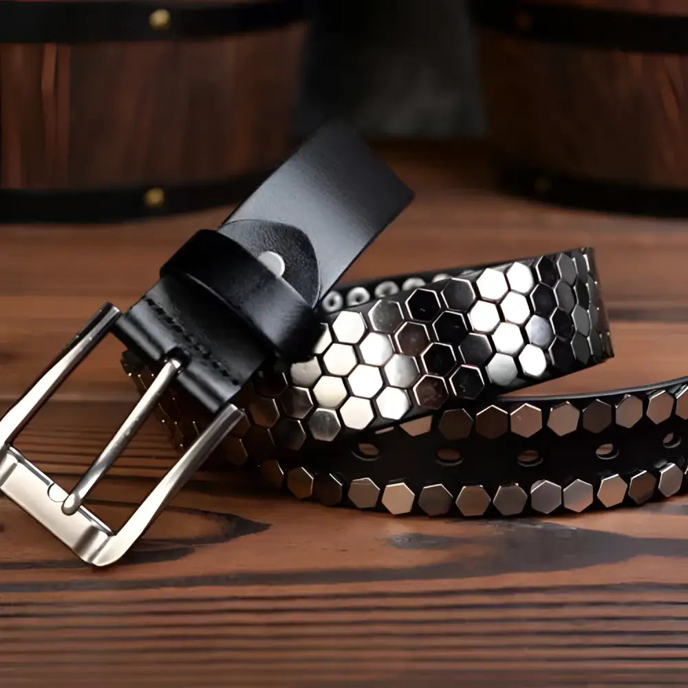 Black leather Osonia Studded Belt with silver hexagonal studs for a stylish look