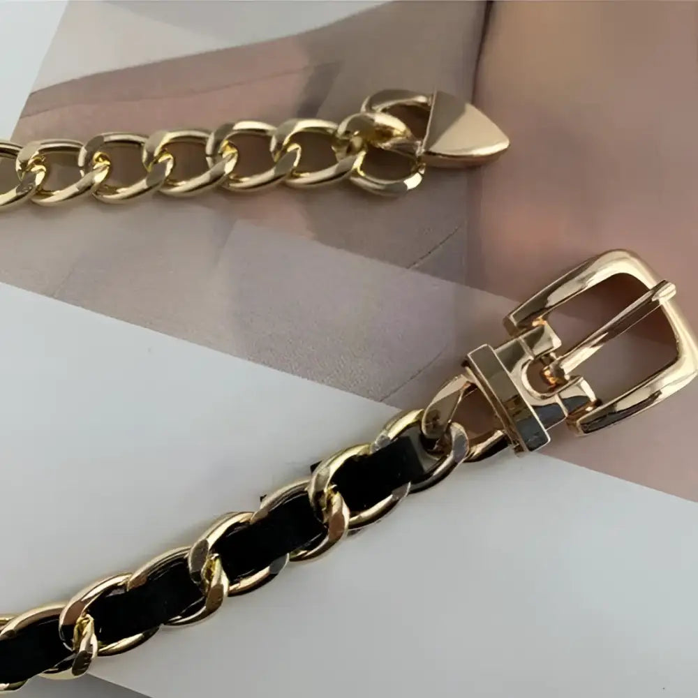 PrayOppé Model Black Blazer featuring a gold chain belt with black accents