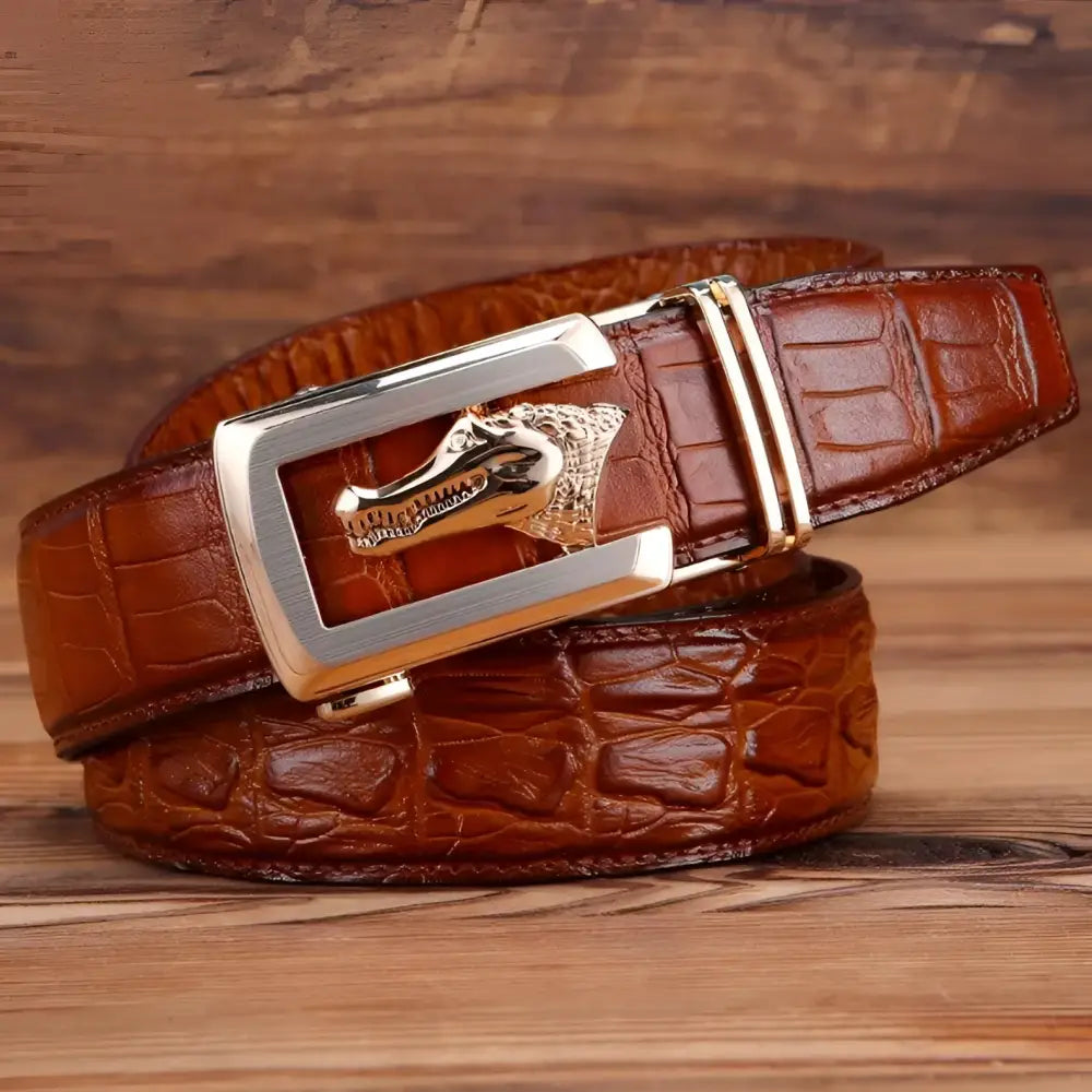 Ravil Belt Set featuring brown crocodile-patterned leather belt with silver and gold buckles