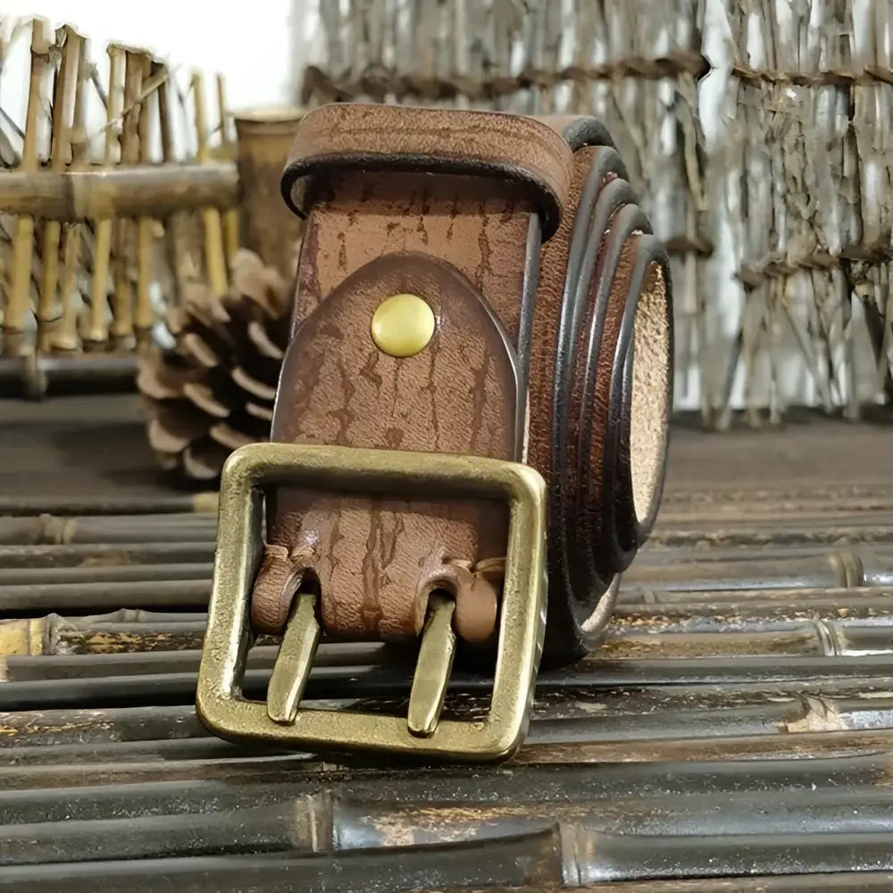 Brown leather belt with a brass buckle from the Set of Four Leather Belts collection