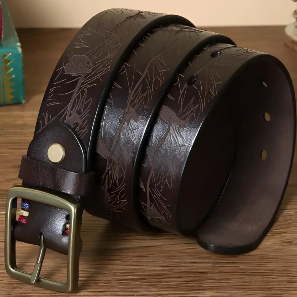 Brown leather belt with floral pattern from the Set of Four Leather Belts with Brass Buckles