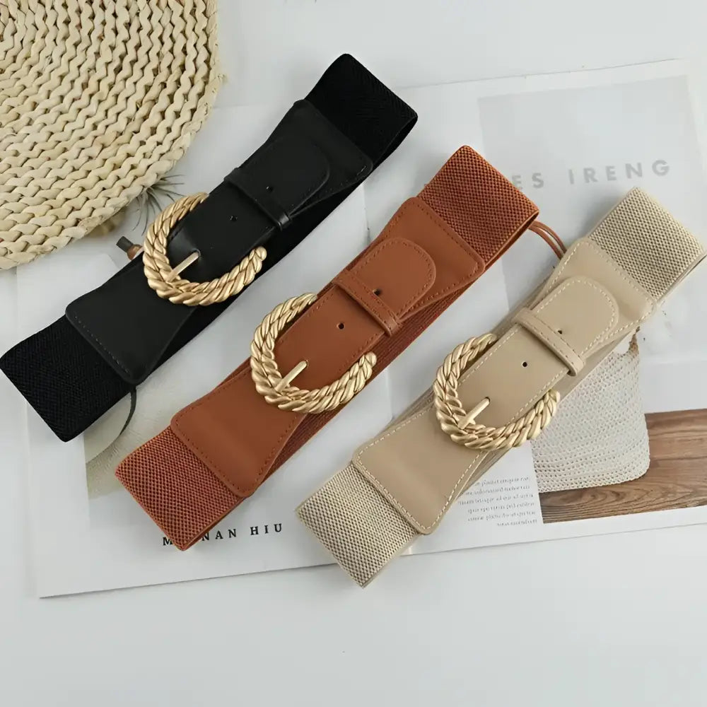Three beige elastic belts with twisted gold buckles from the Sophia Elastic Belt collection