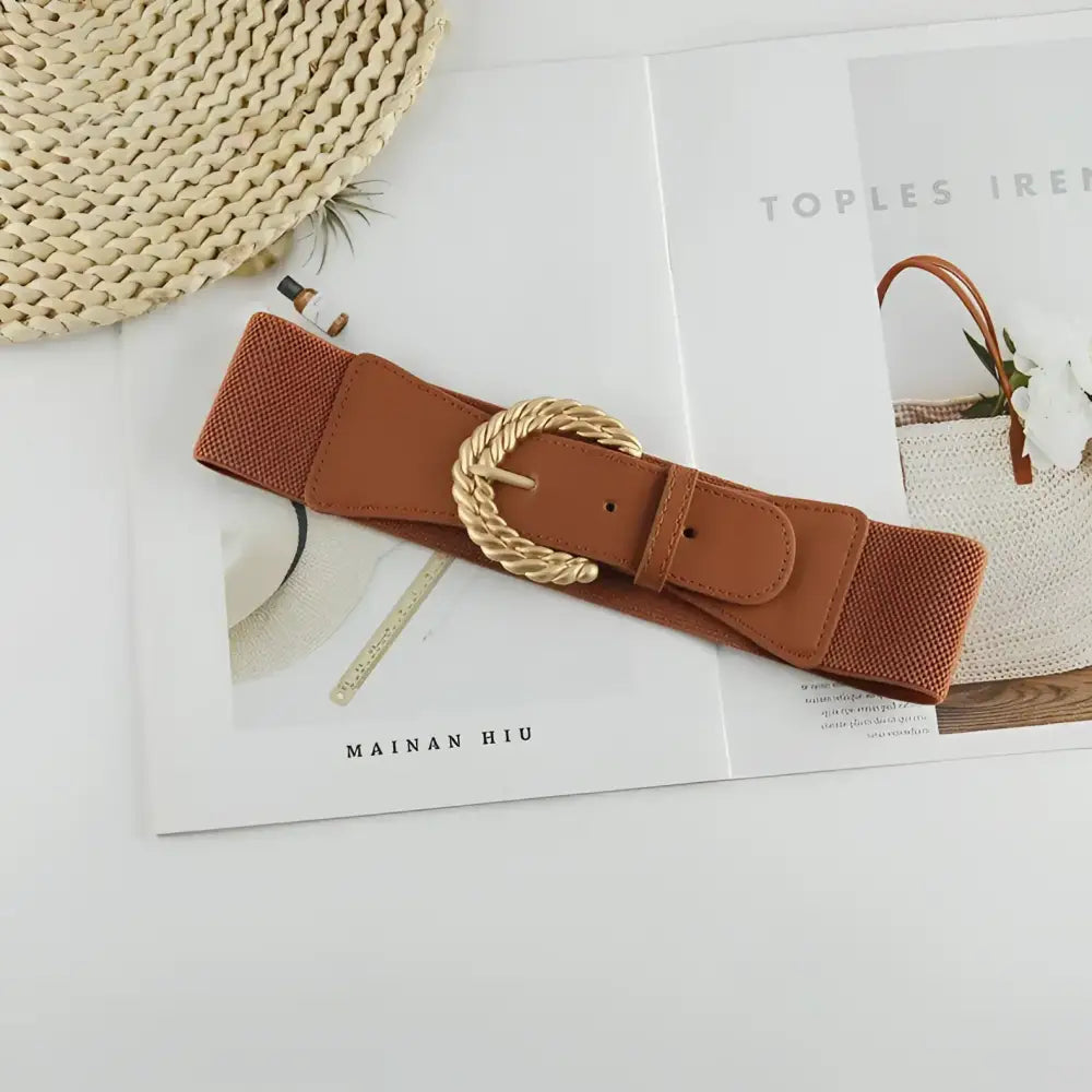 Sophia elastic belt in beige with twisted gold buckle for stylish waist accessorizing