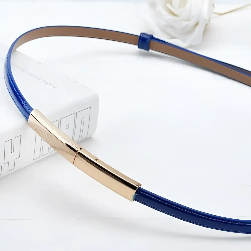 Blue leather belt with a gold buckle from the Stacked Patent Leather Belts collection