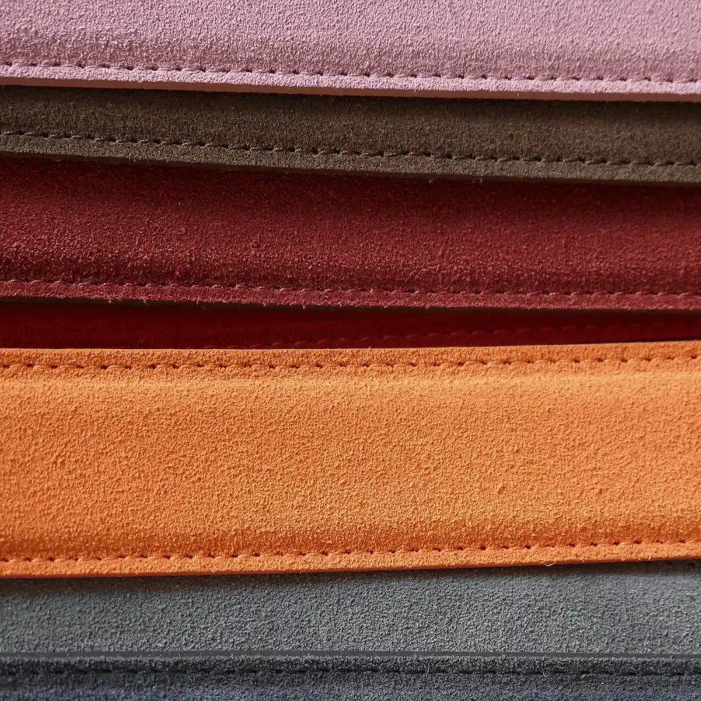 Stacked suede fabric swatches.