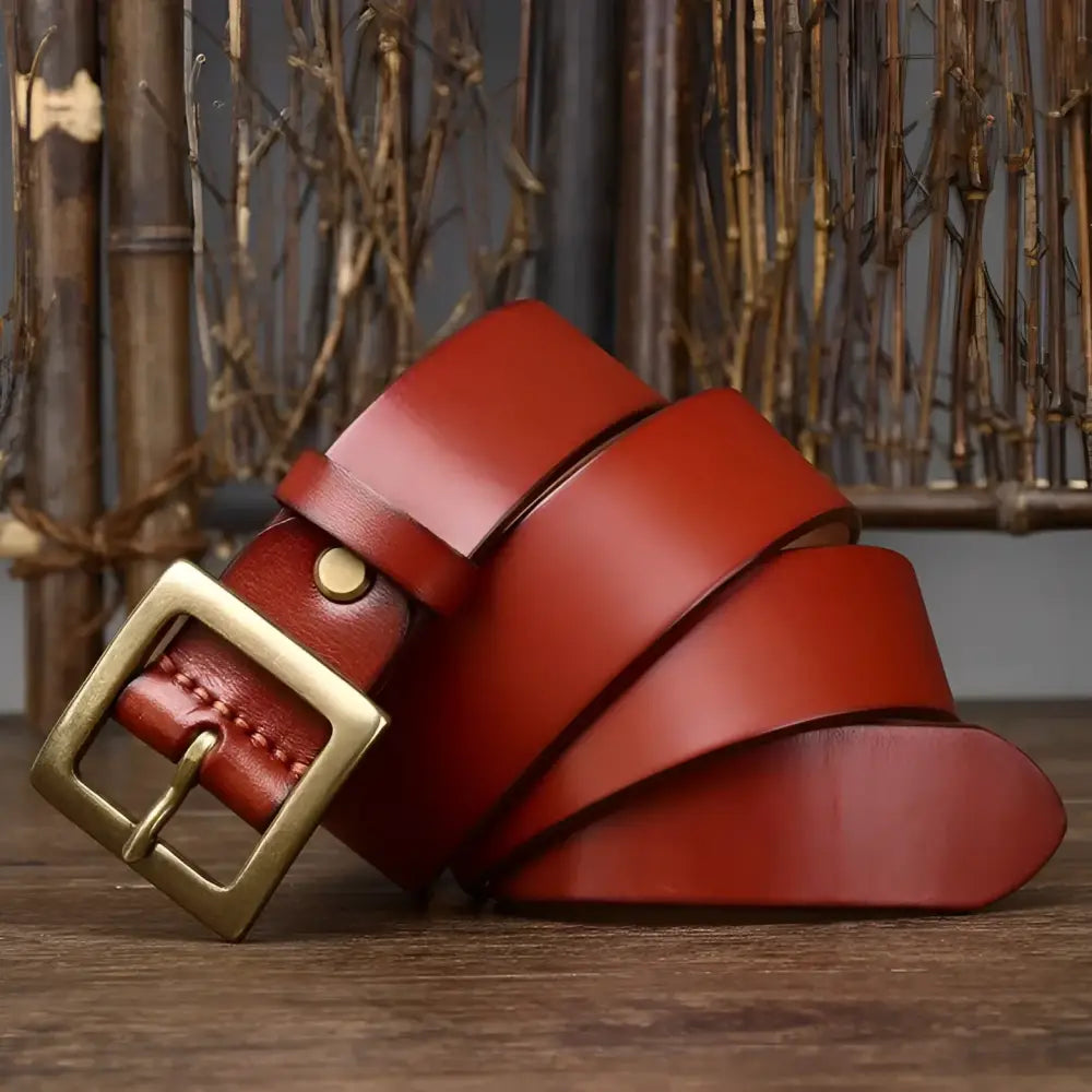 Red genuine leather Stenia Belt with brass buckle for sophisticated style