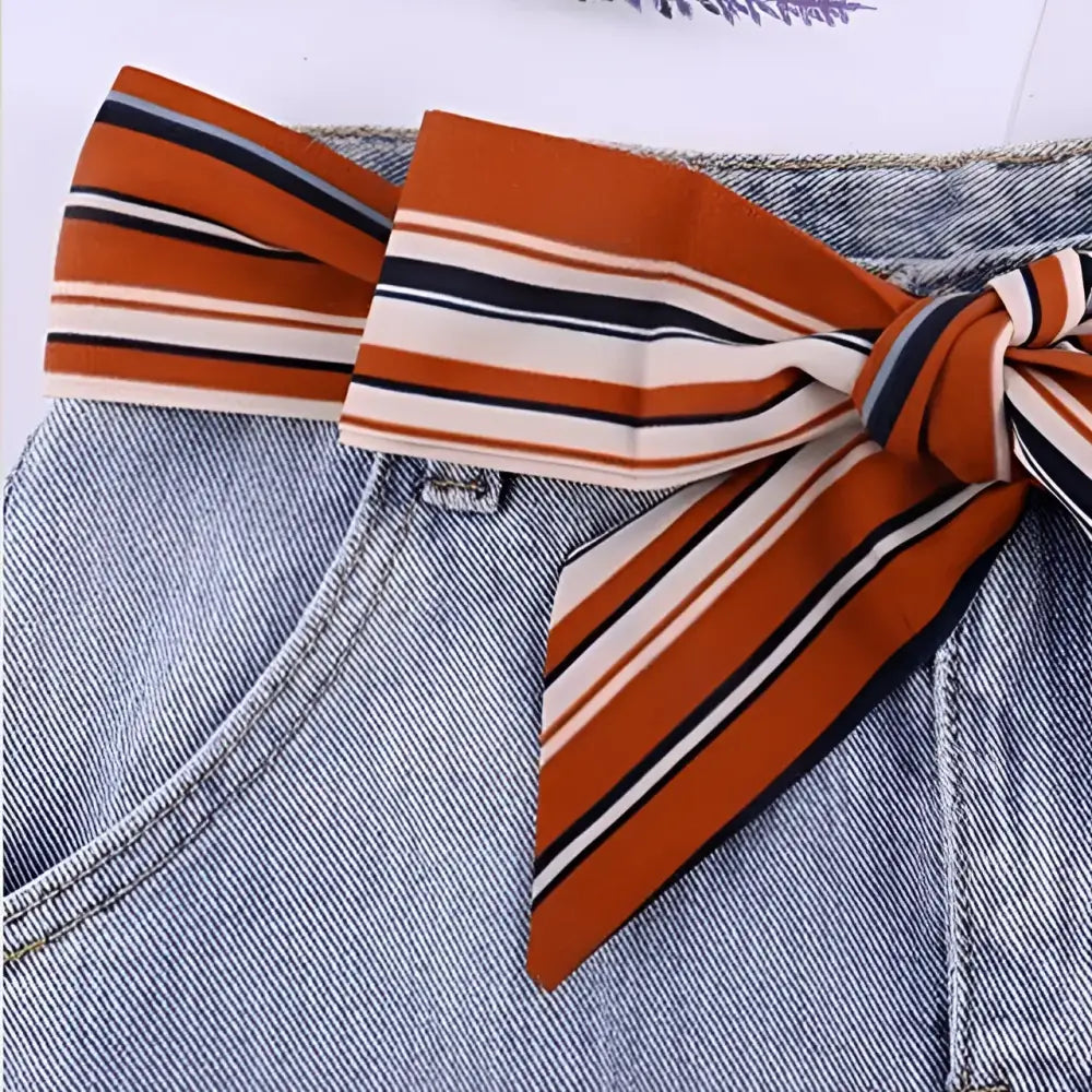 Denim shorts with striped silk scarf belt featuring a stylish scarf belt design