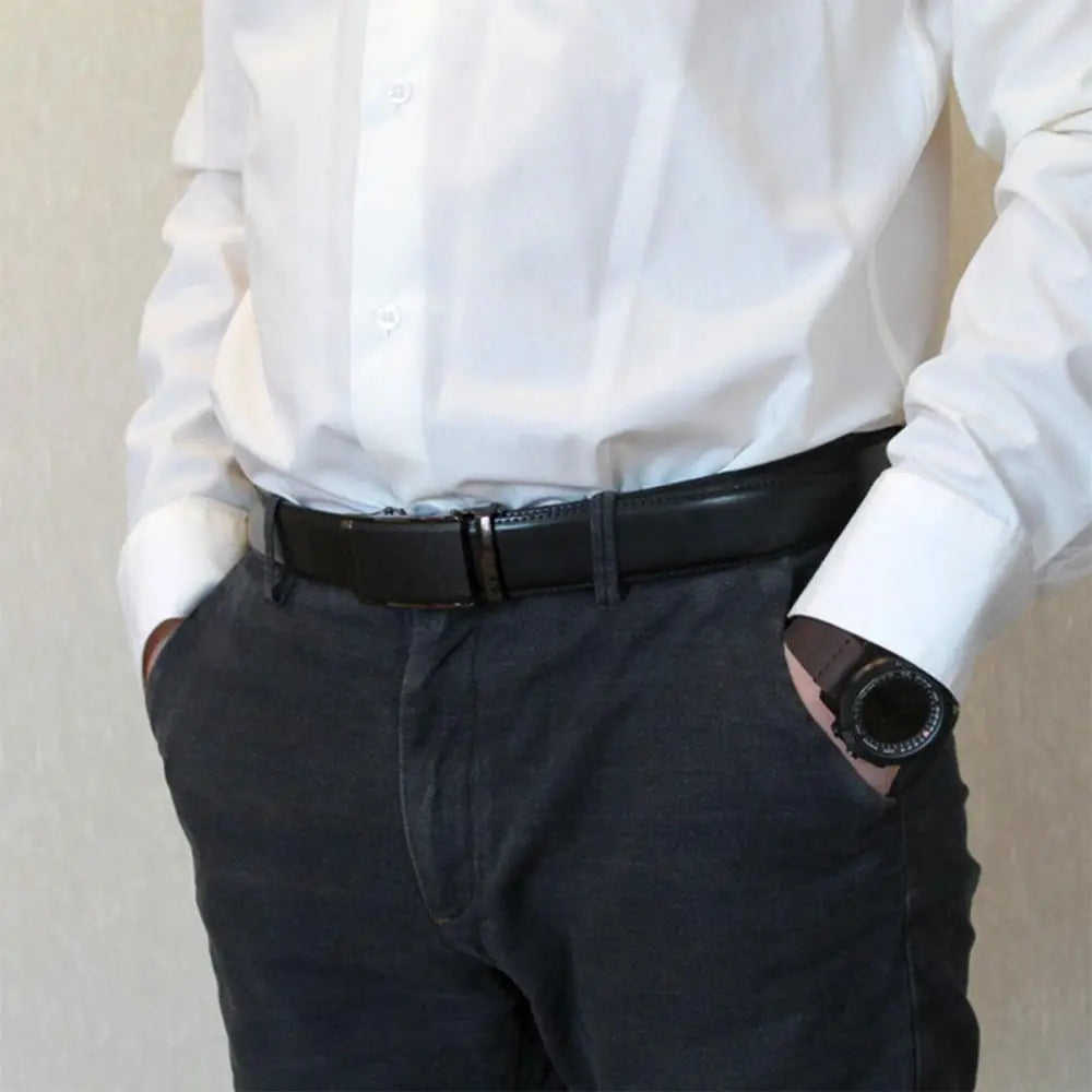 Elegant man wearing formal dress clothes with a black leather ratchet belt