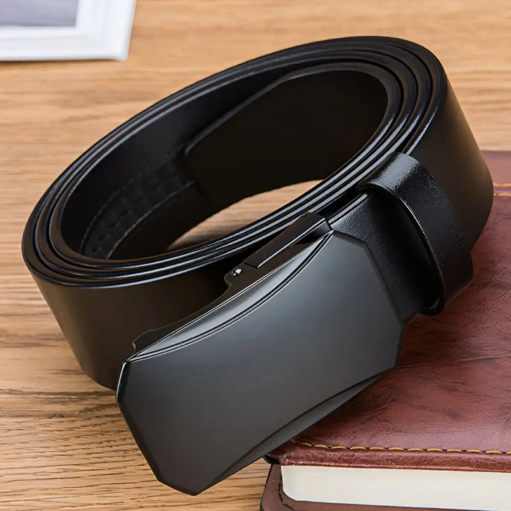 Black full-grain leather ratchet belt with metal buckle for stylish men’s accessories