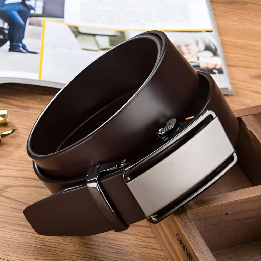 Black grain leather belt for men with silver buckle and brown leather strap
