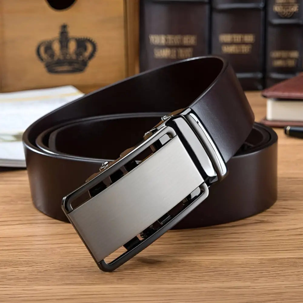Black Grain Leather Belt for Men with Silver Buckle on a Brown Leather Belt image