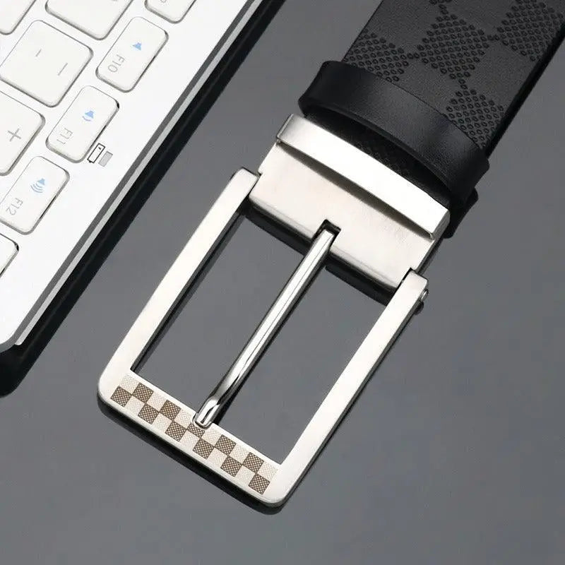 Reversible suit belt featuring checkered pattern and black leather with silver buckle