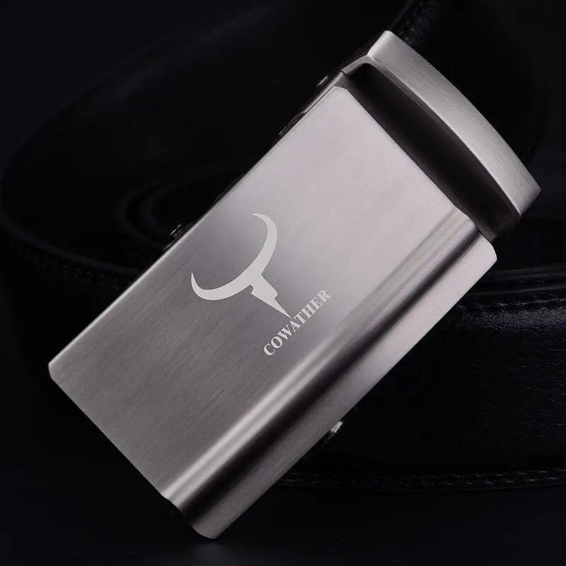 Silver belt buckle displayed on a men’s black V-neck sweater and leather belt