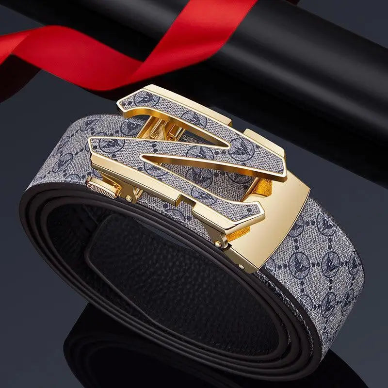 Patterned leather suit belt with gold N buckle, stylish belt en cuir accessory