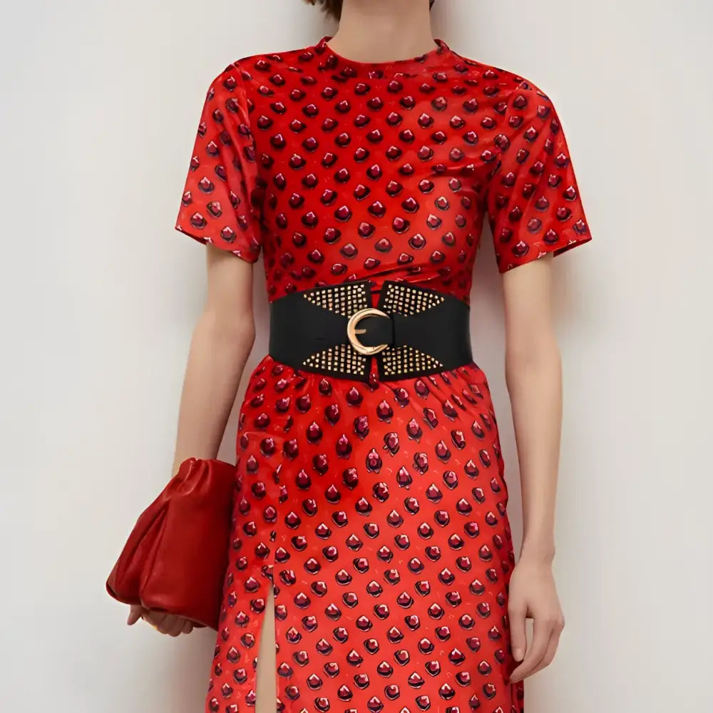 Red patterned dress with susanna belt and wide studded waist belt for fashionable style