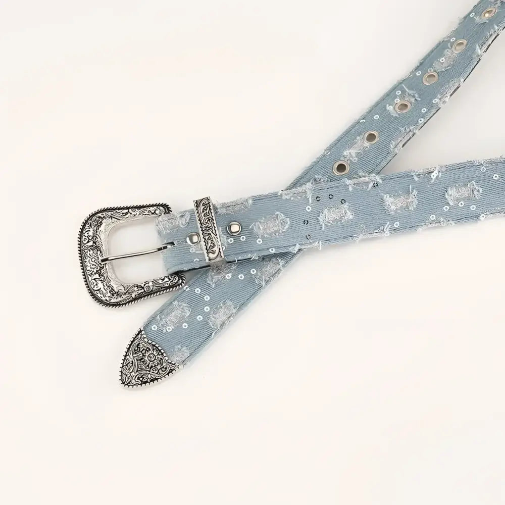 Light blue denim belt with silver decorative buckle for ripped jeans style skirt