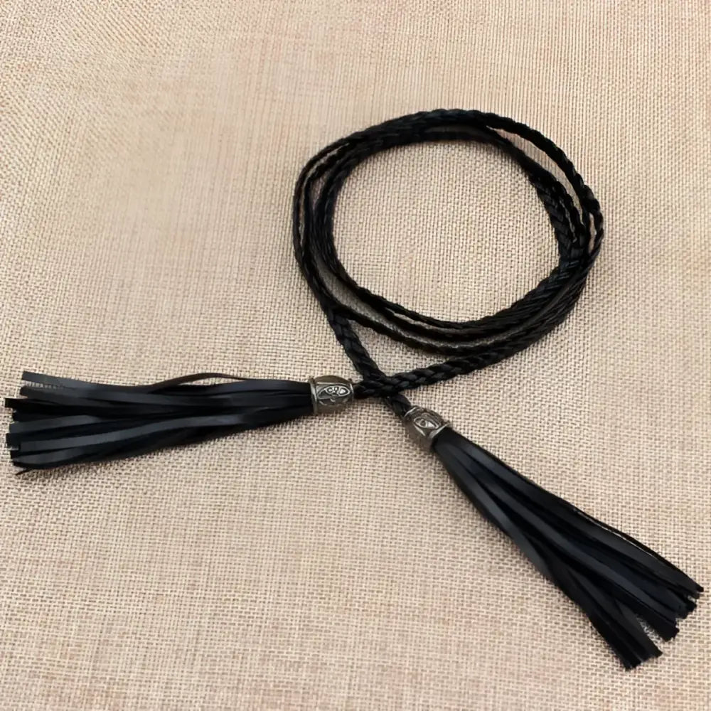 Black braided Tumunia Model tie belt with tassel ends for women