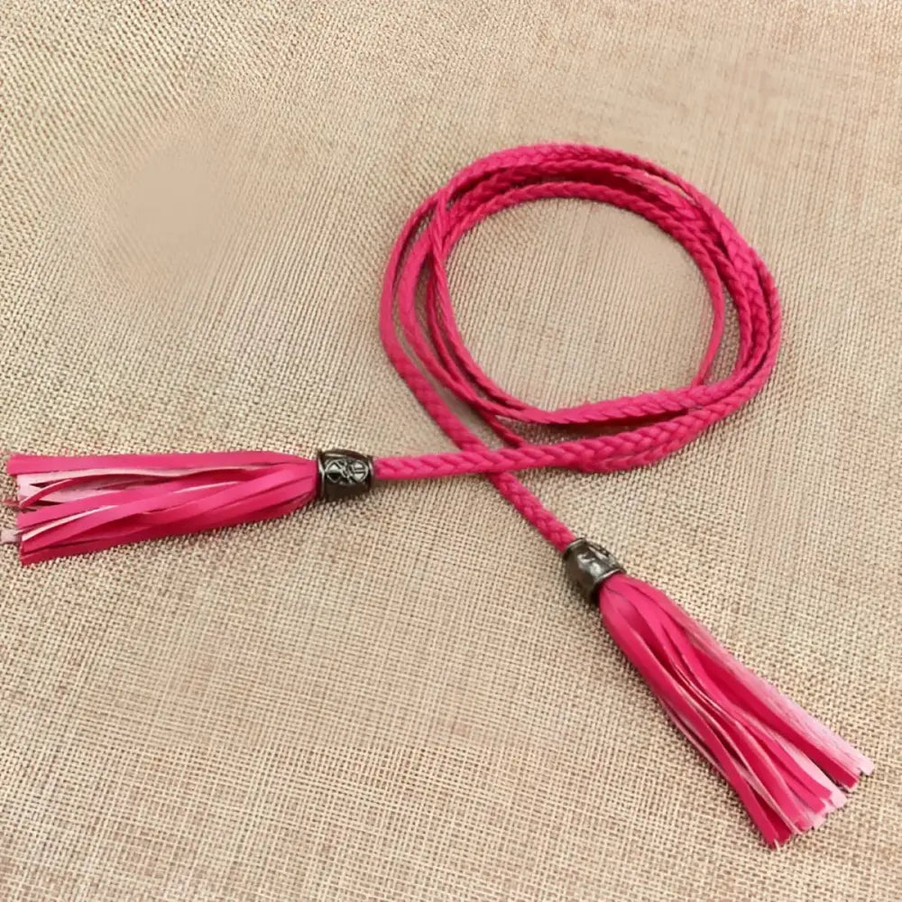 Braided pink Tumunia Model tie belt with tassel detailing for women