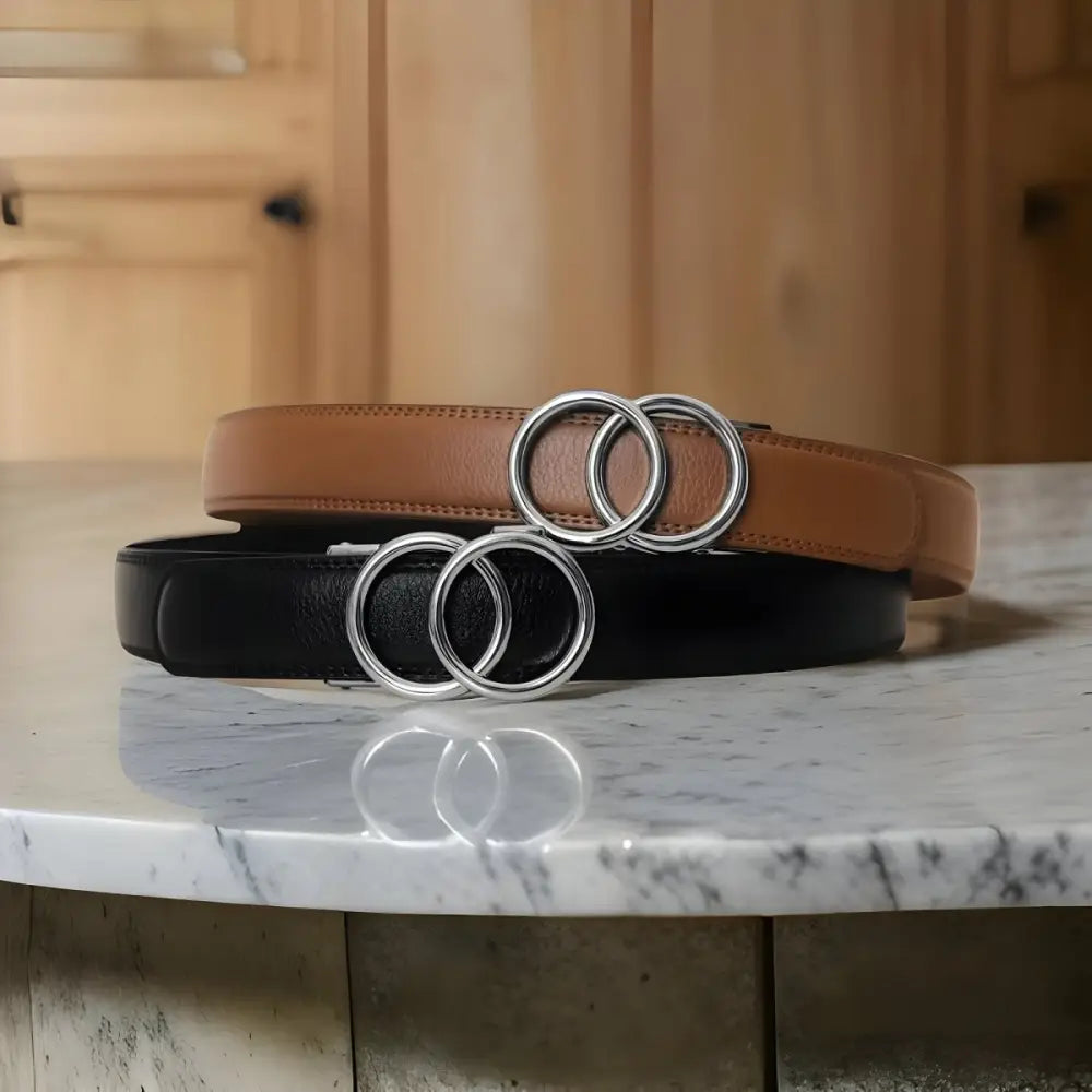 Leather belts with interlocking silver rings accessory for Woman in Black Tank Top and White Pants